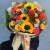 Букет "Ричи" из подсолнухов, альстромерий, гиперикума, роз, скиммии и диантусов в Дзержинском